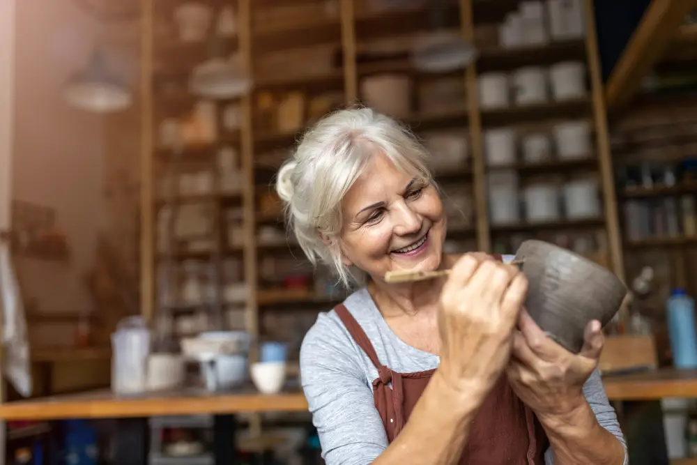 senior woman doing pottery