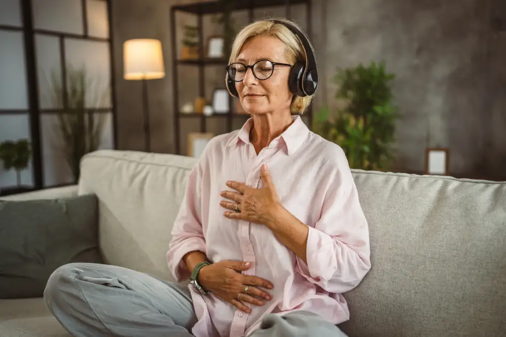 a senior woman meditating at home