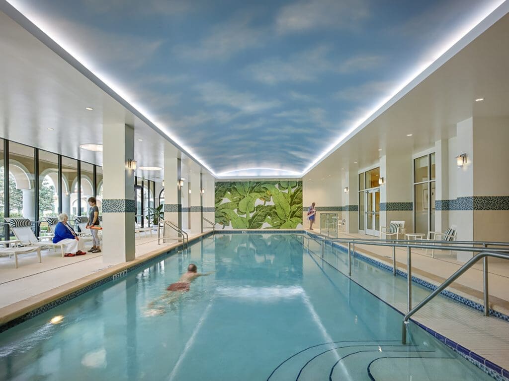 sparkling interior swimming pool at Windsor at Celebration, a rental senior living community in Celebration, Florida