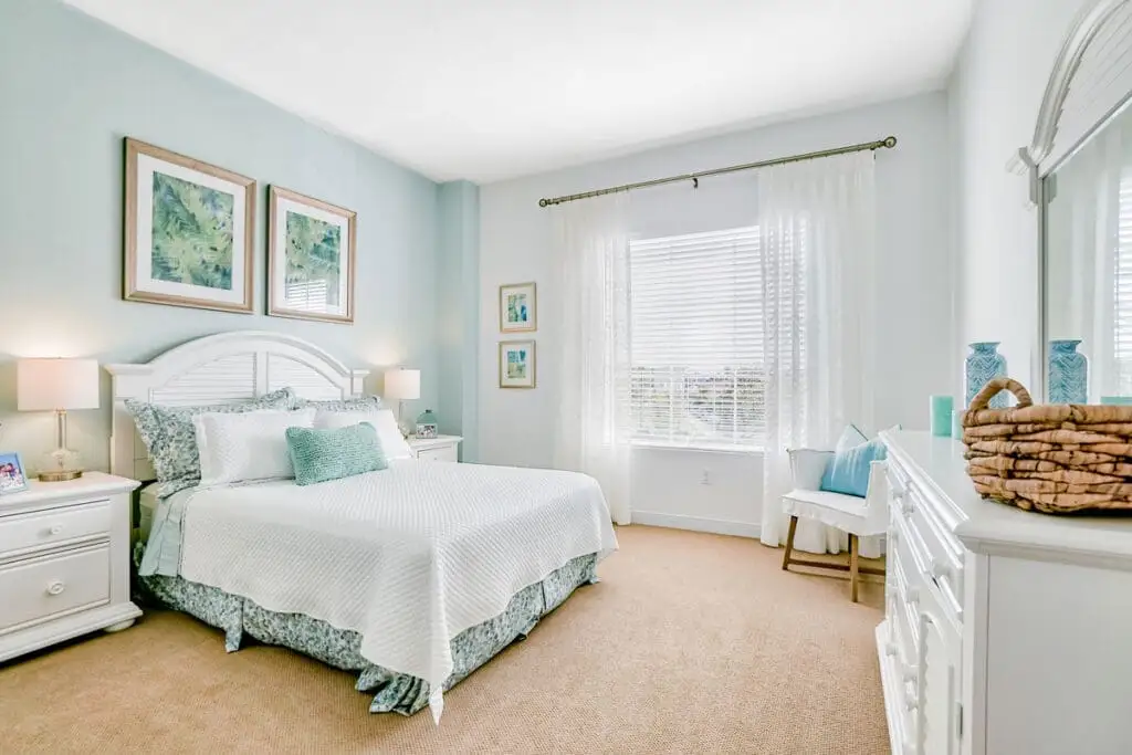 The bedroom in a one-bedroom independent living apartment at Windsor at Celebration. Explore Senior Apartments vs. Independent Living.