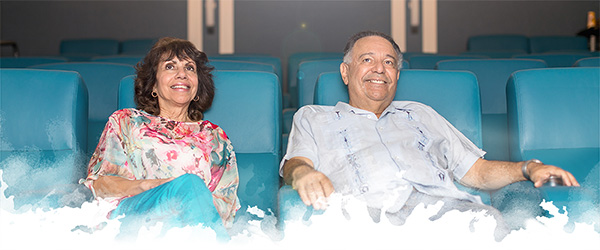 residents watching movie in movie theater